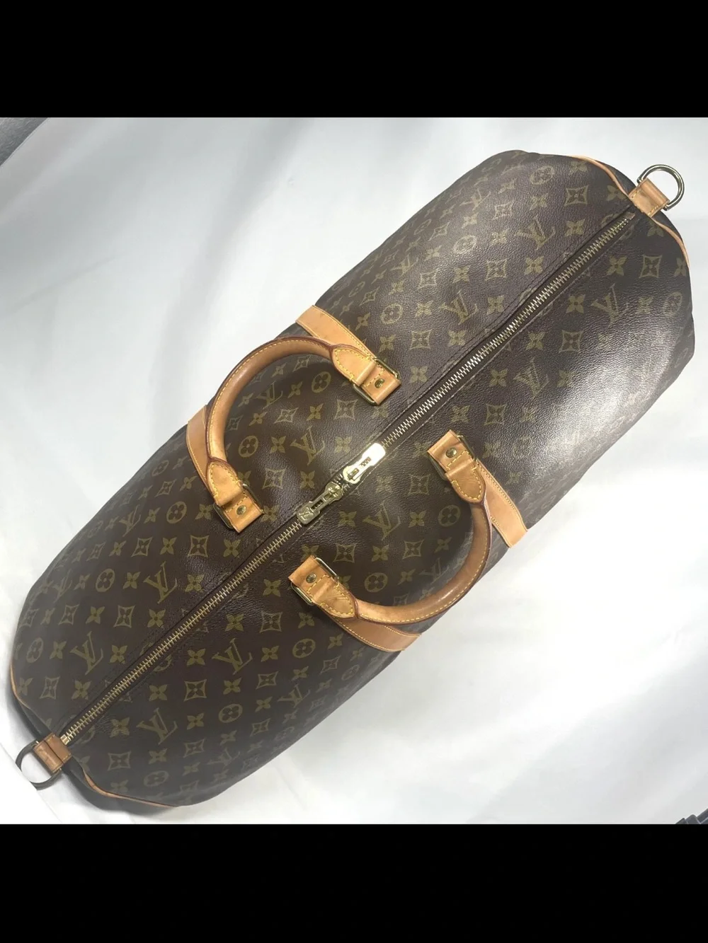 Louis Vuitton Monogram Canvas Duffel with Vachetta Trim in Brown and Tan